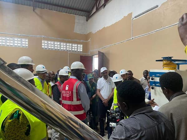 Officials touring the completed ITOJO processing plant