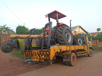 Tractor and agricultural implements transported on a Bellevue low-loader